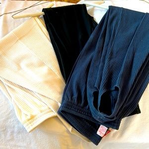 3 pairs of leggings w/stirrup feet Cream, Blue, Black!  Excellent condition